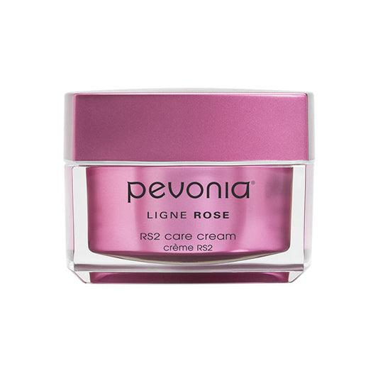 A jar of Pevonia RS2 Rosacea Care Cream with a pink lid on a white background.