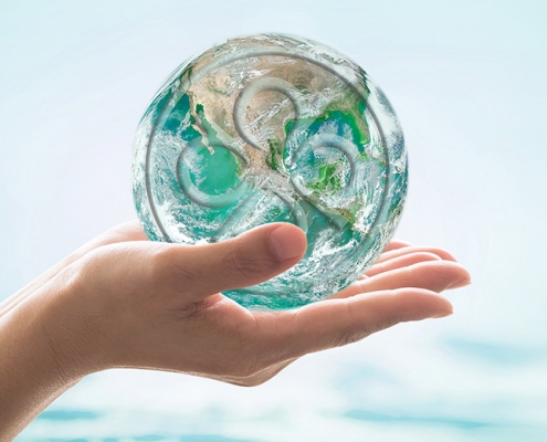 Pevonia pro-global-earth day, hands holding a green globe with Pevonia logo