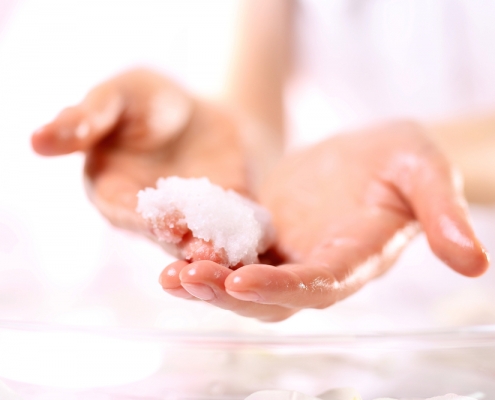 hands with a exfoliant