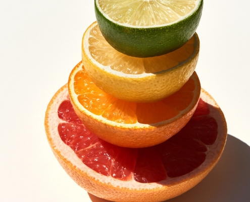 Vitamin C sources - orange lemon nectarine grapefruit slices - citrus