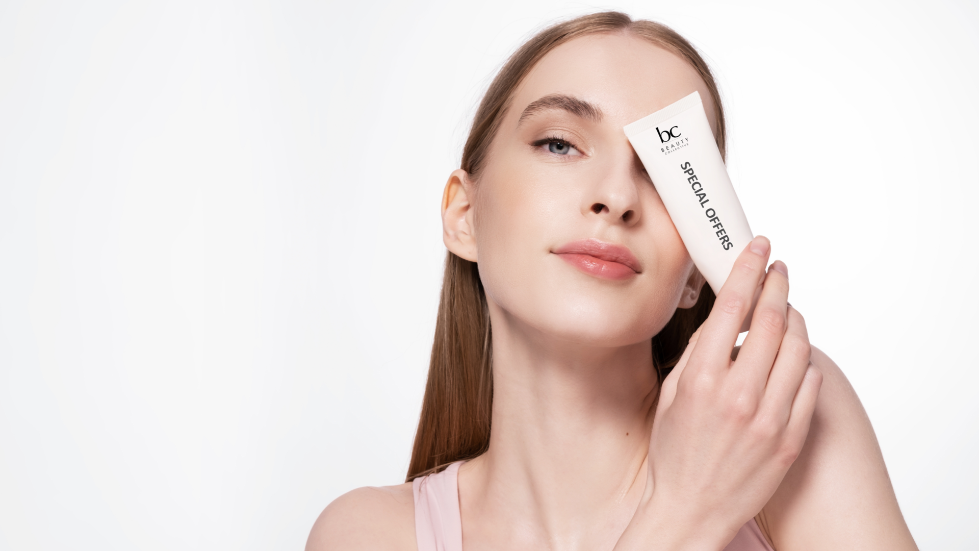 woman holding a skincare tube special offers
