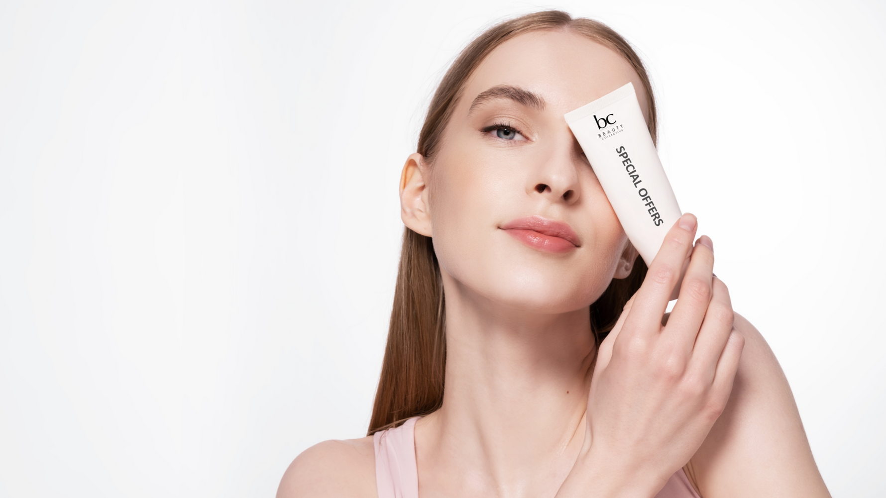 woman holding a skincare tube special offers