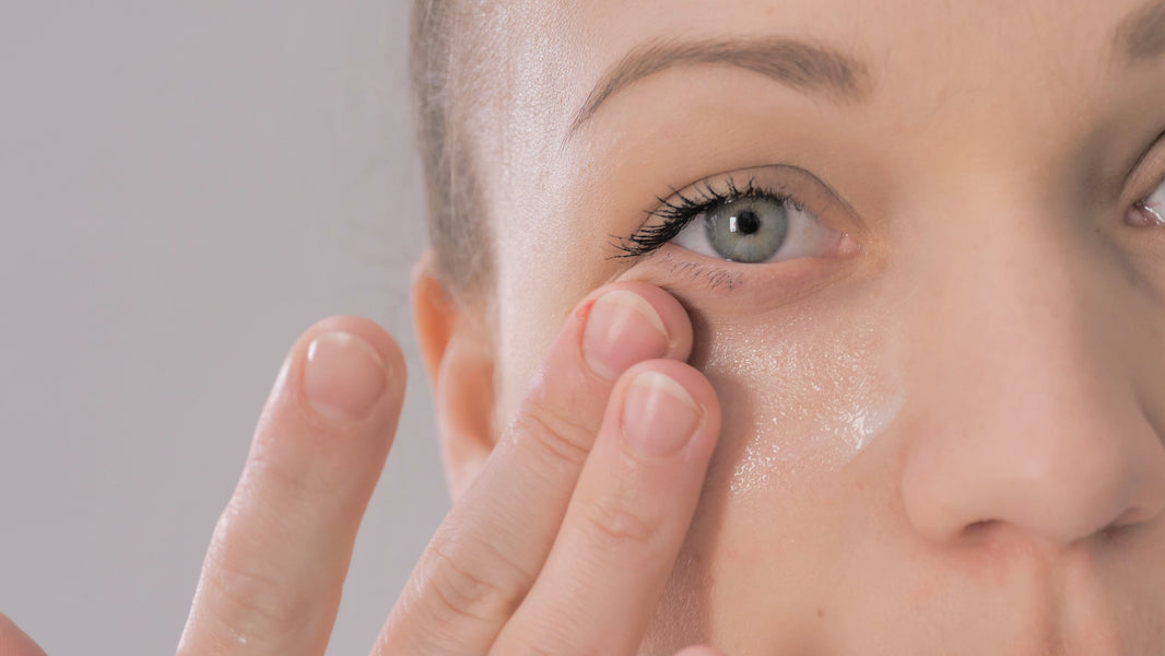 Woman with bright, refreshed eyes after using skincare eye treatment