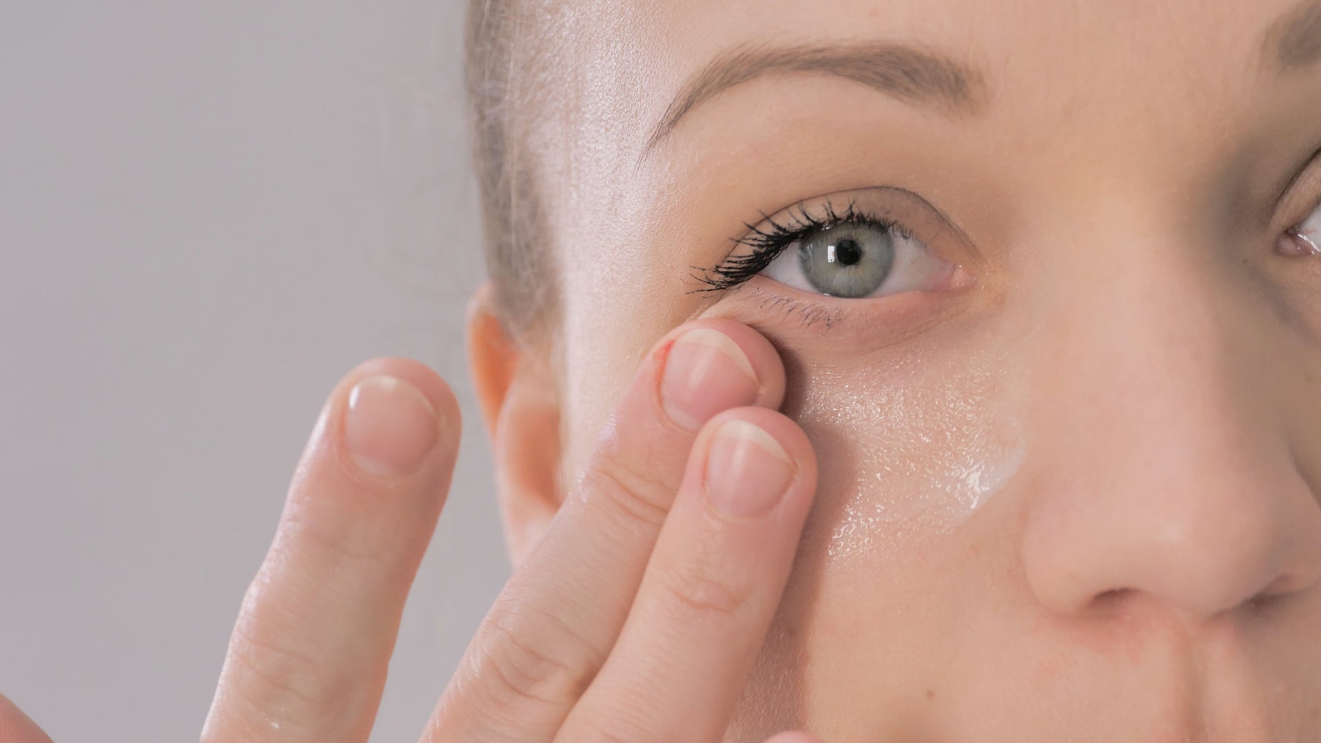 Woman with bright, refreshed eyes after using skincare eye treatment