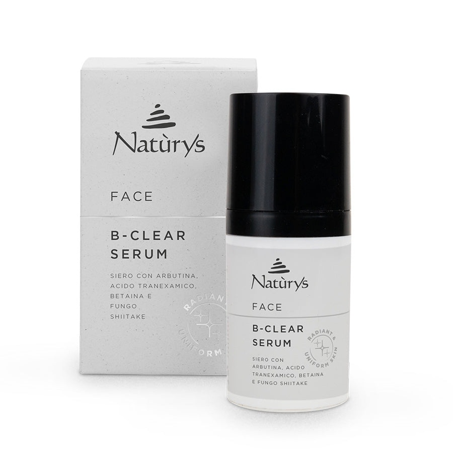 A bottle of Naturys Face B-Clear Serum 30ml with its packaging box. The serum is in a white container with a black cap, and the box has the Naturys logo and product information.