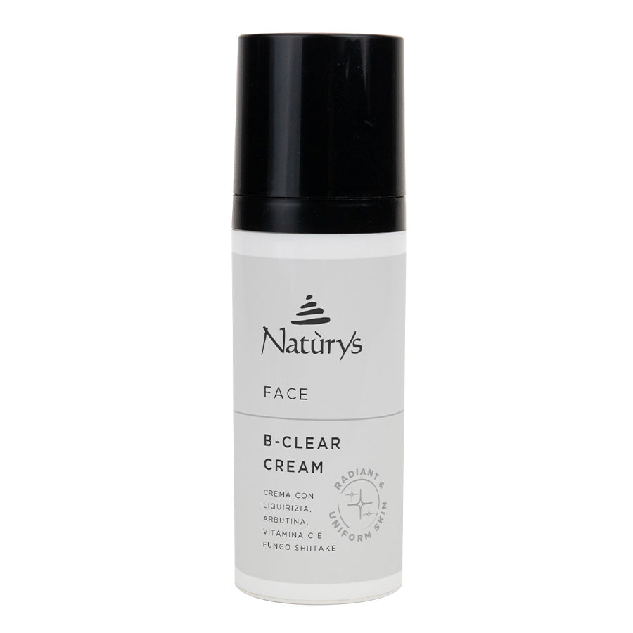 A white pump bottle with black text labeled 'Naturey's FACE B-CLEAR CREAM', indicating it is a skin care product designed to clear the face.