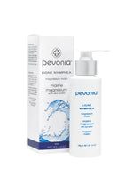 Pevonia Marine Magnesium product packaging and bottle, with a white pump dispenser. The packaging is predominantly white with blue text and accents, and an image of seawater splashing.