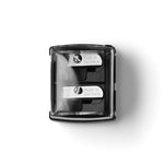 Black pencil sharpener with 'Made in Germany' label on a white background