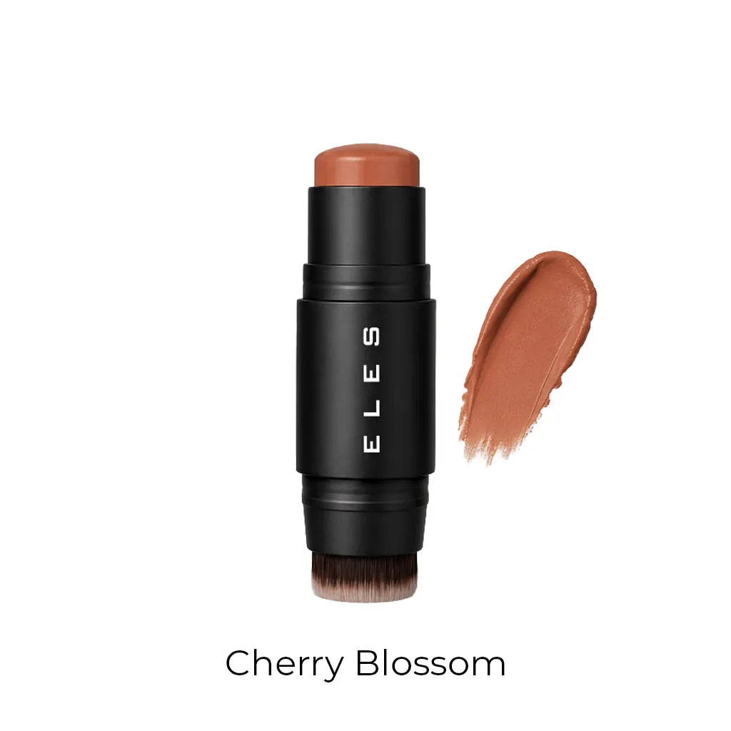 ELES Cherry Blossom makeup stick with a black cylindrical case, showing the peachy-brown cream product and a matching cream swatch on a white background.