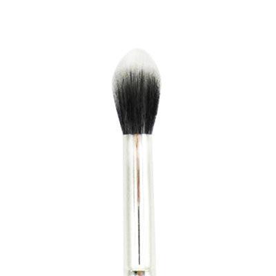 Makeup brush with black bristles on a white background