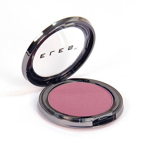 Pink blush compact with open lid on a white background