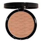 Compact powder in a black case on a white background