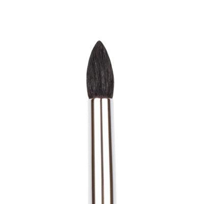 Nail art brush with black bristle head on a white background