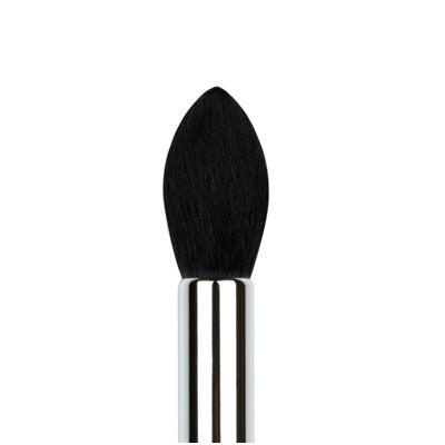 Makeup brush with black bristle head and silver ferrule on a white background