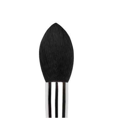 Black makeup brush with striped handle on a white background