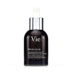 A black bottle of Vie Collection Serum De Vie High Performance Youth Concentrate with a white pump dispenser, labeled in white and silver text.