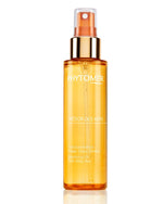 Orange spray bottle with 'Phyto' branding on a white background