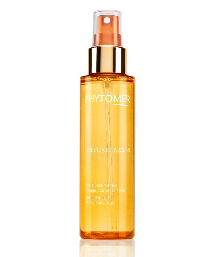 Orange spray bottle with 'Phyto' branding on a white background