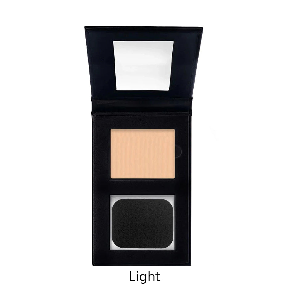 Compact powder in a black case with a mirror on a white background