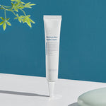 Tube of Moisture Max Hydro Cream on a white surface with a blue background