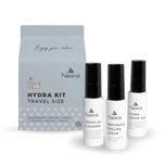 Naturys Hydra Kit travel size with three bottles and a box on a white background