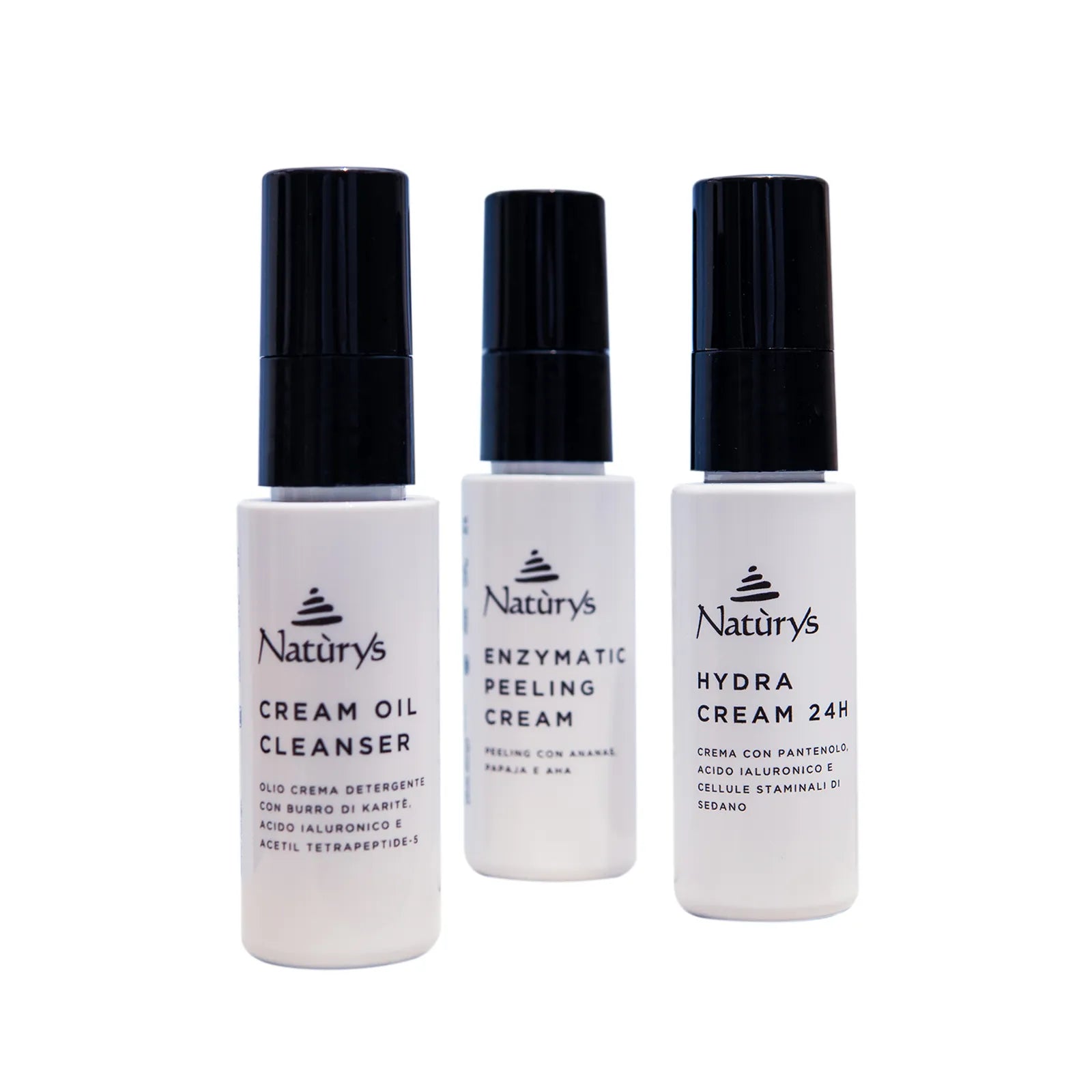 Three bottles of Naturys skincare products on a white background