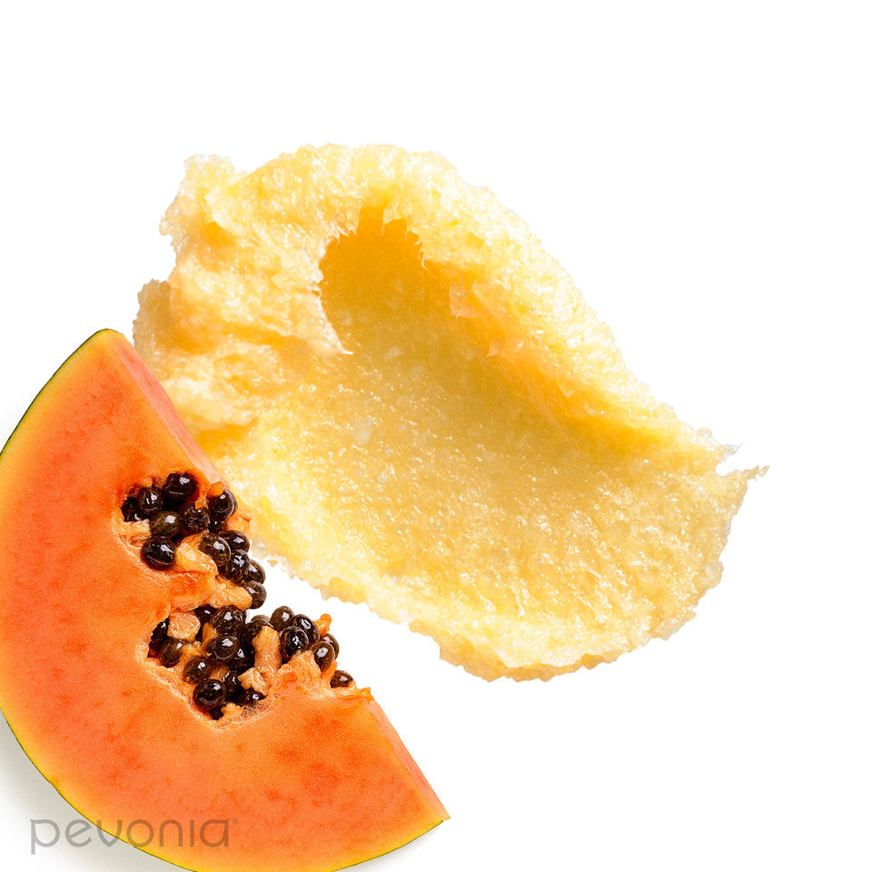 Pevonia De-Aging Saltmousse Papaya Pineapple Halved papaya on a white background Texture-and-ingredients