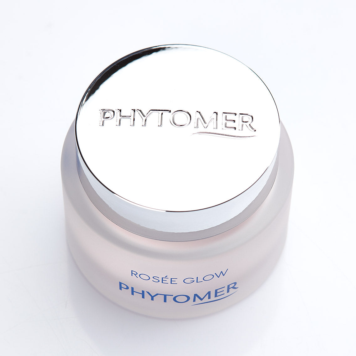 Phytomer Rosee Glow - Vitamin Radiance Plumping Cream on a pink background