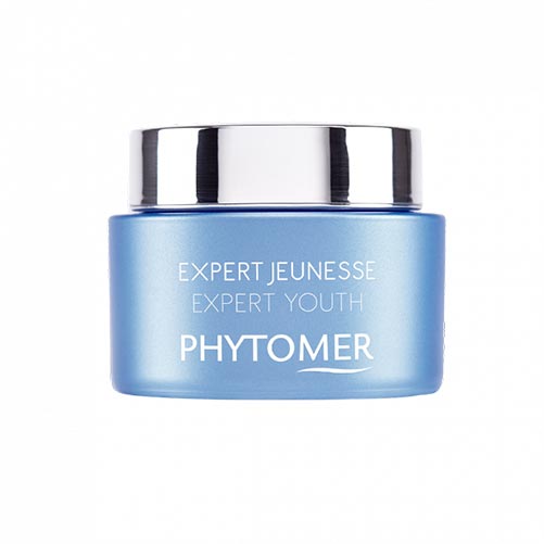 A jar of PHYTOMER Expert Youth Wrinkle Plumping Cream with a blue label and a silver lid.