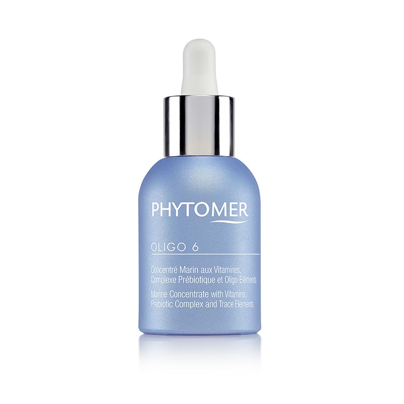 A blue glass bottle with a white dropper labeled 'PHYTOMER Oligo 6 - Marine Concentrate with Vitamins, Prebiotics & Trace Elements 30ml'.