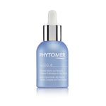 A blue glass bottle with a white dropper labeled 'PHYTOMER Oligo 6 Marine Concentrate 30ml'.