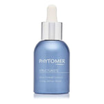 A blue bottle with a white dropper label reads 'PHYTOMER STRUCTURISTE Firming Contour Serum', indicating the product is for skin firming and contouring.