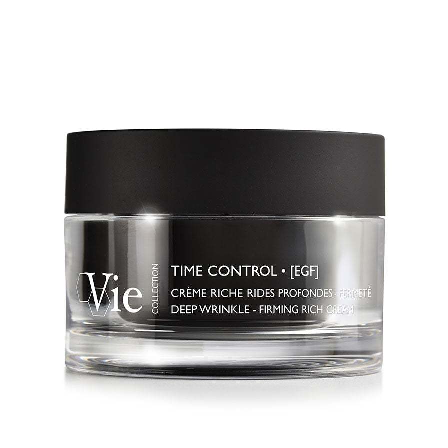 A jar of Vie Collection Time Control Deep Wrinkles Firming Rich Cream with a black lid on a white background.
