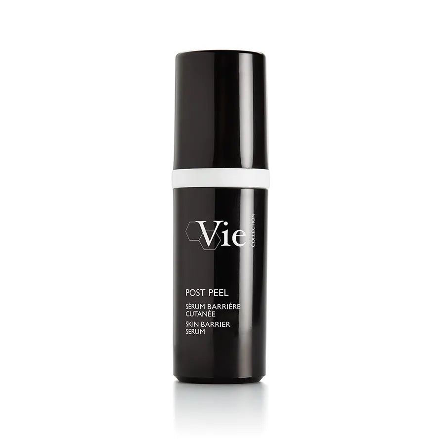 A black and clear bottle with a white label that reads 'Vie', containing a skin barrier serum.