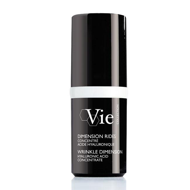 Black skincare bottle labeled 'Vie' on a white background