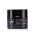 A black jar with a white label that reads 'Vie Collection Night Balm Rich Multi-Youth Cream'.