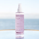 phytomer rosee visage toning cleansing lotion mist limited edition on a reflective surface with a blurred background