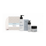 Naturys Moisturising gift set with cream-oil cleanser, Hydra Serum 24H, Hydra Cream 24H and white cosmetics bag on white.