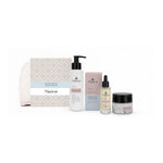 Naturys Sensitive gift set with micellar cleansing gel, Hydra Oil, De-Sensitive Cream and white cosmetics bag on white.