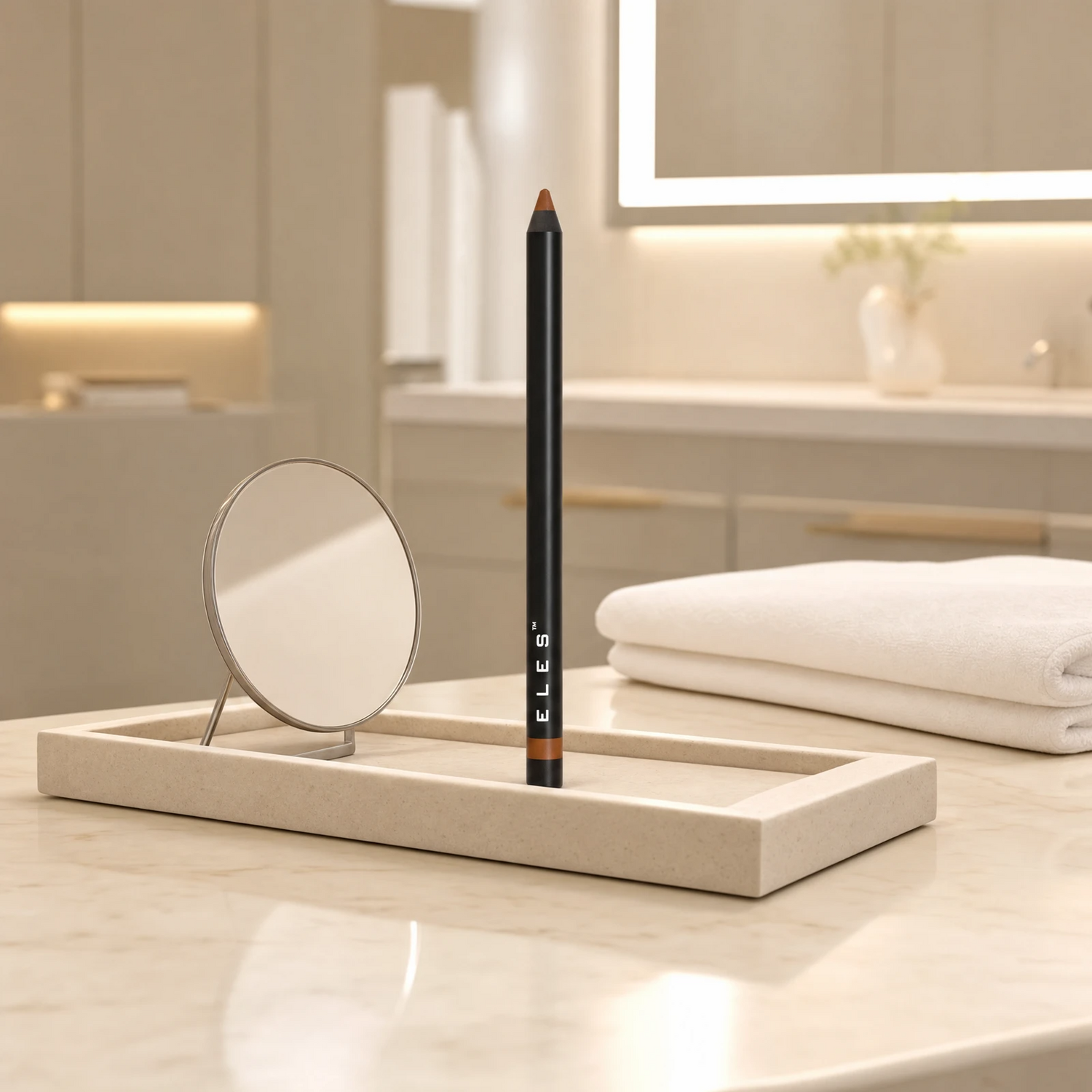 ELES Gel Lipliner standing upright on a stone tray beside a round mirror on a marble clinic bench inside a premium skin clinic treatment room, ideal for professional lip definition.