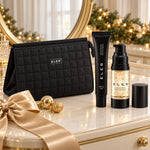 ELES Mineral Flawless Finish Foundation & Lumiere Glow Primer Christmas Gift Set displayed on a festive vanity. File: eles-mineral-flawless-finish-foundation-and-lumiere-glow-primer-christmas-gift-set-christmas-vanity-2026.jpg
