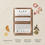 ELES Youth Recovery Sheet Mask ingredient flatlay featuring hyaluronic acid, Damascus rose oil, vitamin C and niacinamide, and hydrolyzed collagen on a warm limestone surface