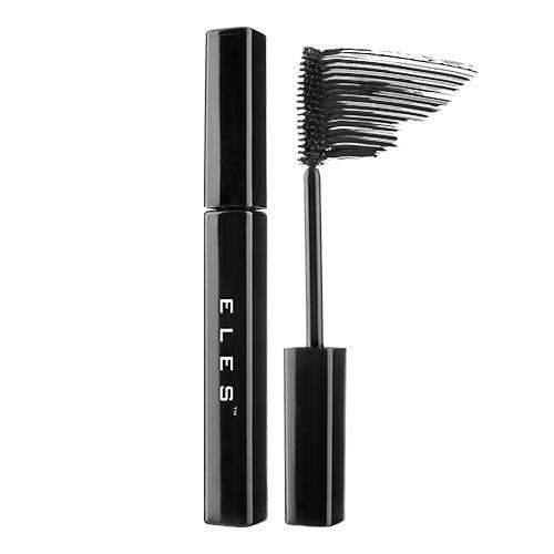 Black mascara with brush and packaging on a white background