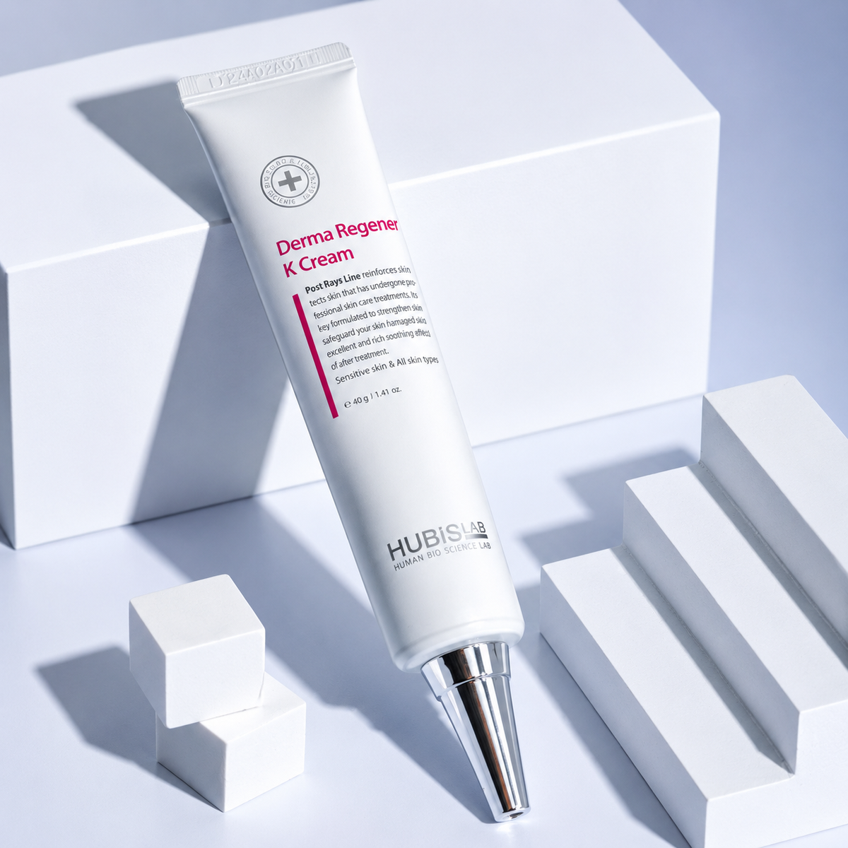 Hubislab Derma Regener K Cream 40ml skincare tube displayed on white geometric studio blocks.