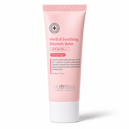 Pink tube of Herb & Soothing Blemish Balm with white cap on a white background