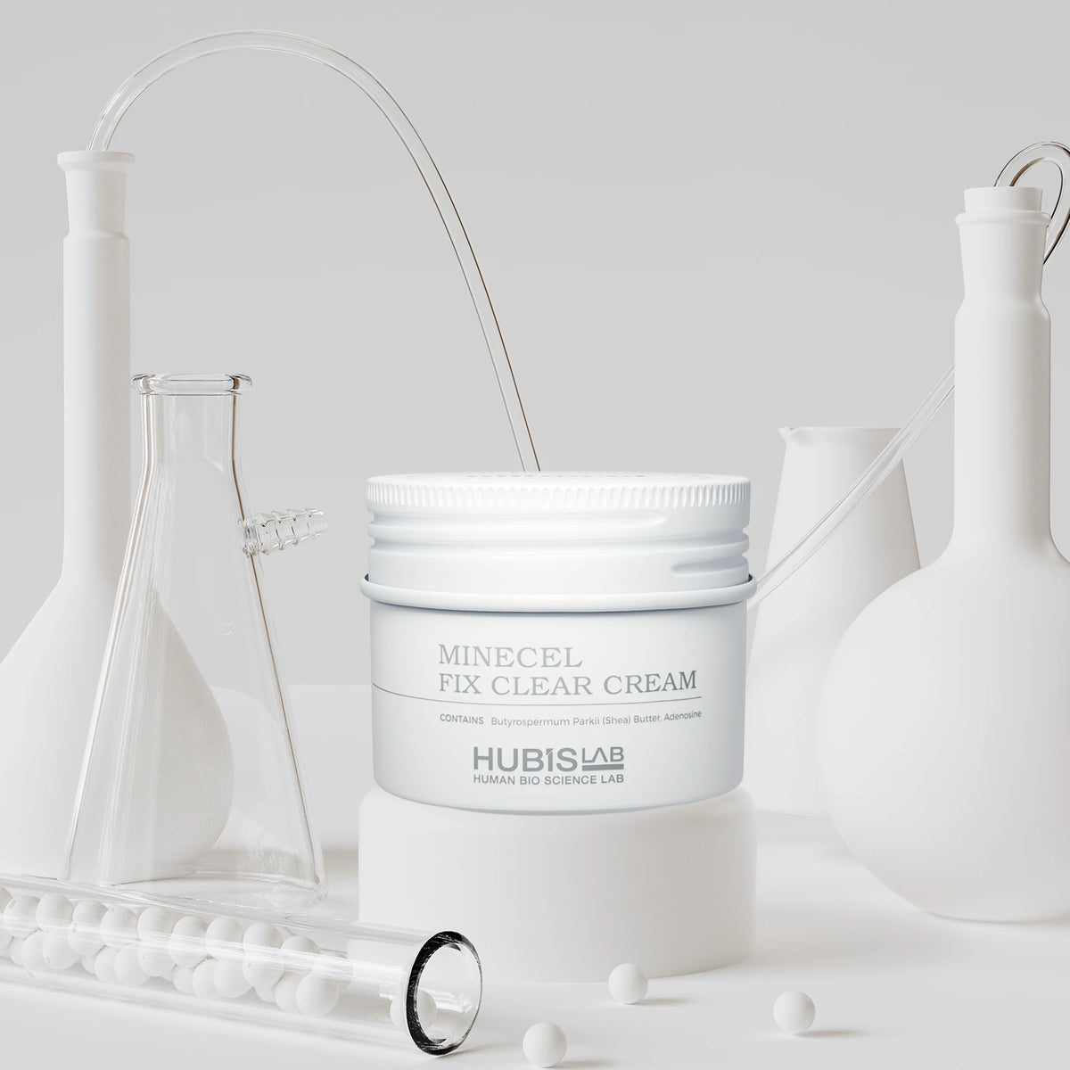 Hubislab Minecel Fix Clear Cream 50ml  for sensitive, dry or post-treatment skin on a white background with scientific flasks.