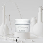 Hubislab Minecel Fix Clear Cream 50ml  for sensitive, dry or post-treatment skin on a white background with scientific flasks.
