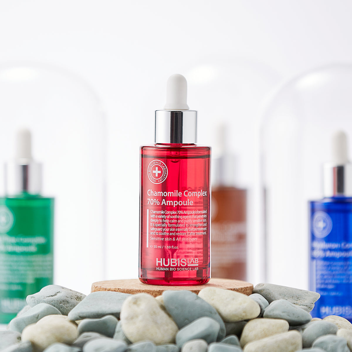 Hubislab Post Rays Chamomile Complex 70% Ampoule 50ml on bed of rock pebbles