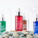 Hubislab Post Rays Chamomile Complex 70% Ampoule 50ml on bed of rock pebbles