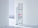 A white bottle of Post Rays Derma Regener K Solution by Hubislab in stylish white setting